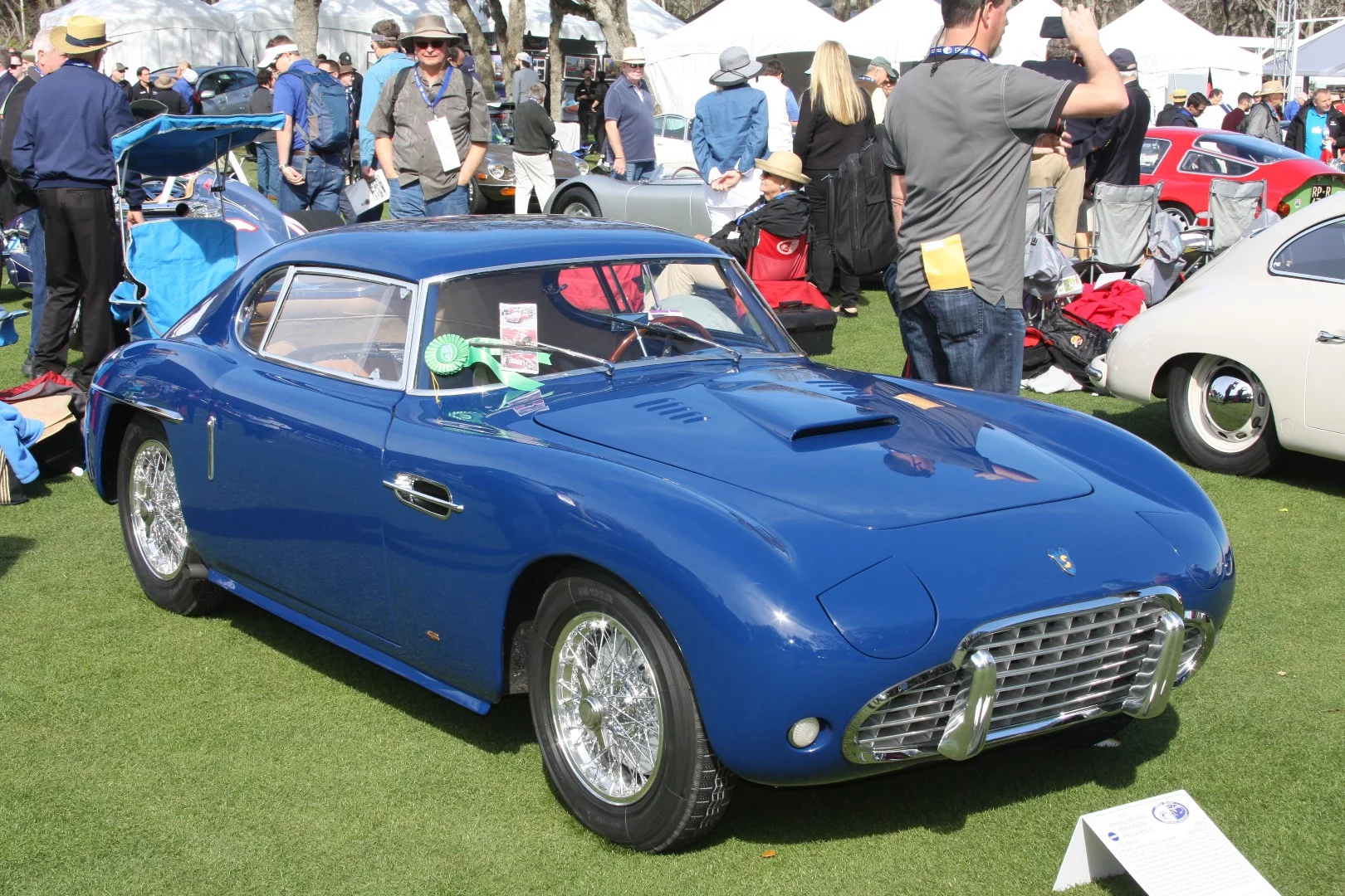 This 1954 SIATA is one of 11 cars bodied by Balbo and powered by a Fiat 8V engine.Imported in 1953, it was purchased second hand from a used car lot in Queens, New York by Dr Julius Eisenstark and has remained in the family since, being shown in the Amelia Concours by Walter and Rosanne Eisenstark. Last June while being road tested by a technician, the car was hit from behind and damaged extensively by a driver who was texting. The damage catalyzed a complete restoration to original, as it presented at Amelia Island Concours.