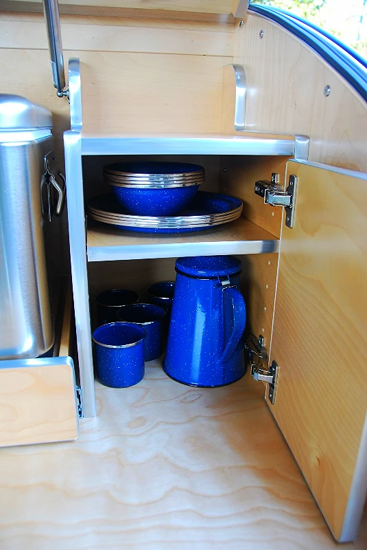 The galley includes two cabinets for storage