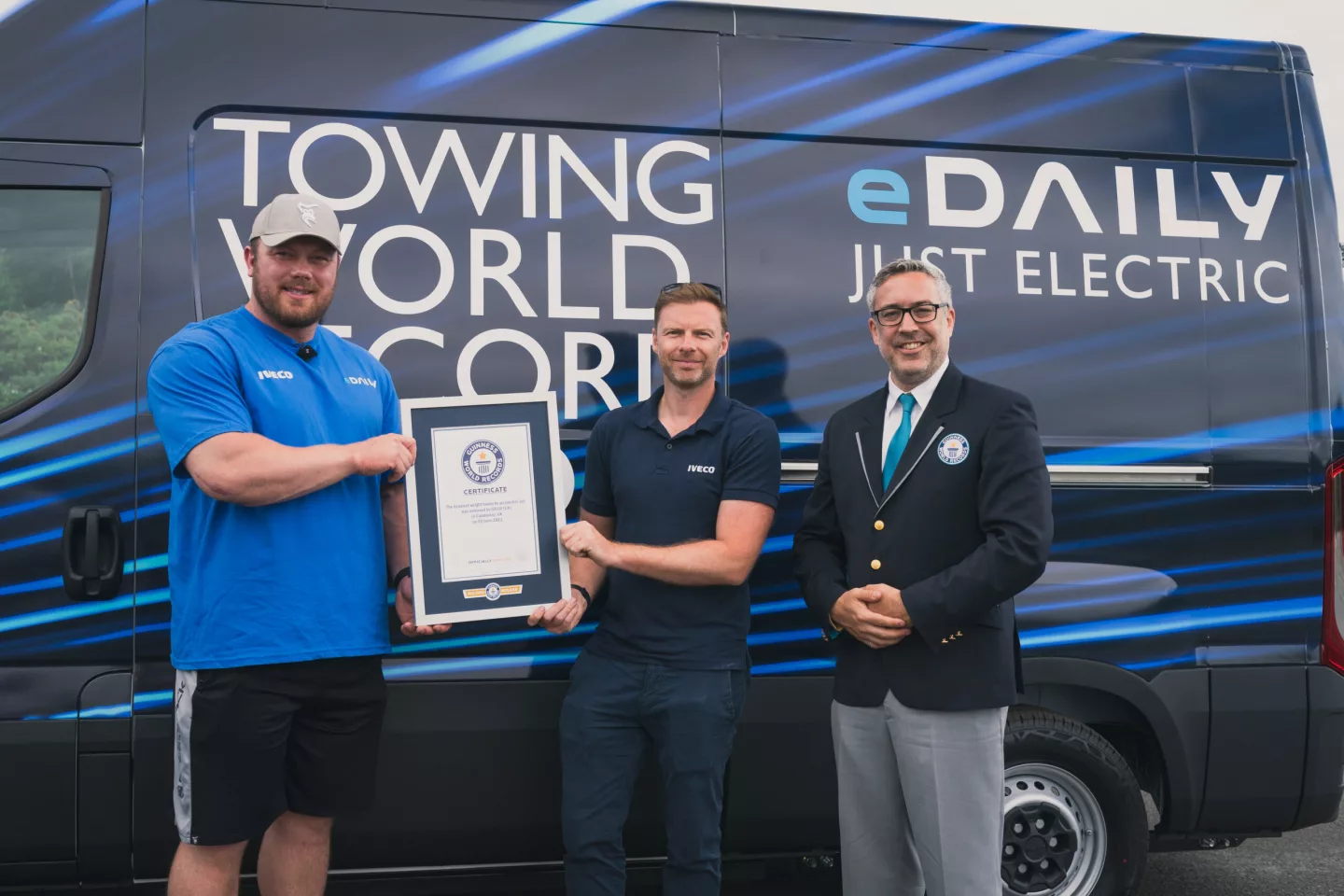 The record-breaking eDaily towed a lorry carrying an earth-mover, a construction truck filled with rocks, and an airport fire truck