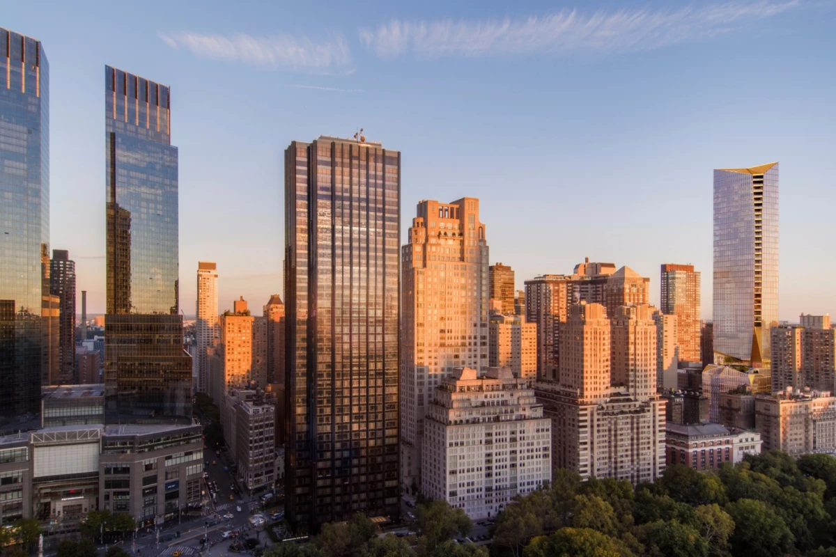 The tower to be constructed at 50 West 66th Street, seen on the right, will be finished in limestone, bronze and glass