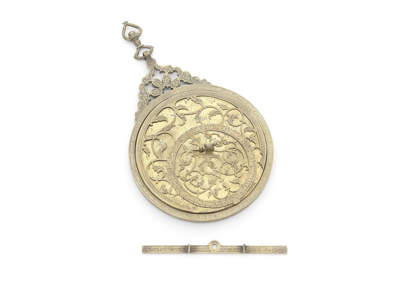 A decorative brass astrolabe-style instrument, modern