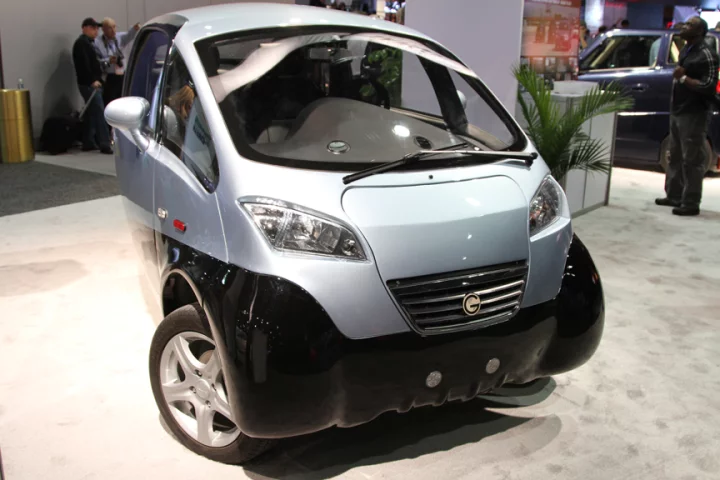 The TRIAC three-wheeled electric vehicle competes with regular gas-powered cars on performance and price