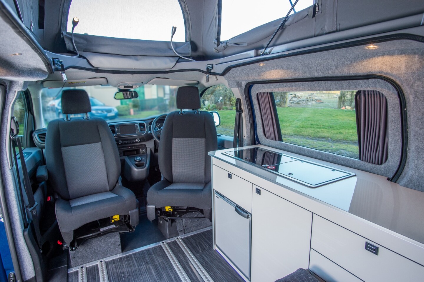 The pop-up roof expands the interior and can house an optional bed