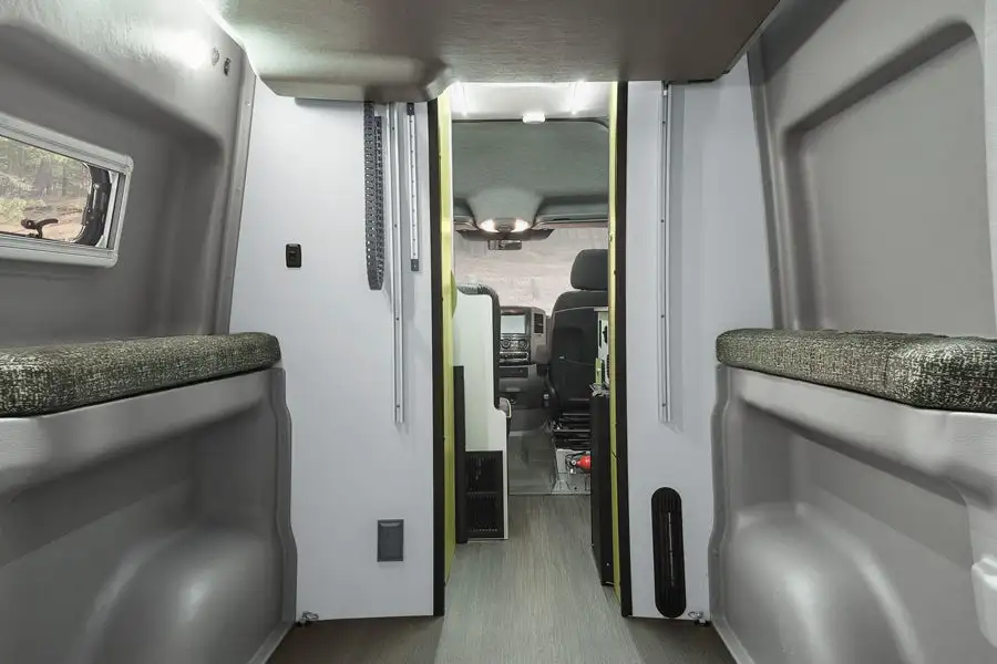 The Winnebago Revel's power-lift bed makes room for gear in back ... because what good is an off-road adventure van without some toys