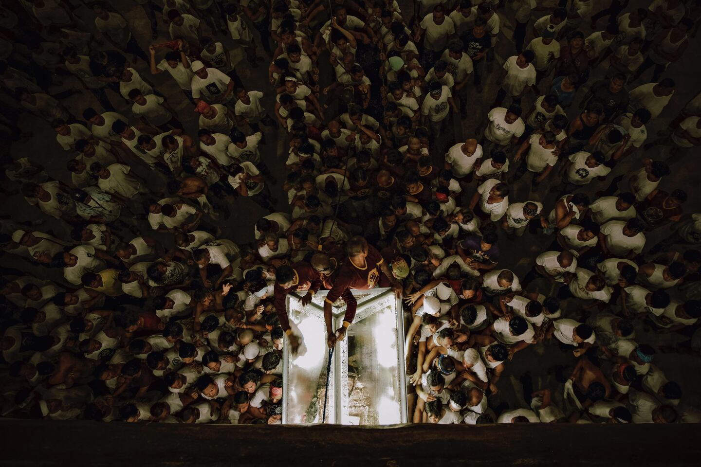 Winner in ‘The Photojournalist’ category. This incredible series documents an annual religious ritual in Lucban, Quezon Philippines. A procession moves a glass coffin carrying an image of Jesus Christ through the town. Participants believe the tradition will bring luck and success.