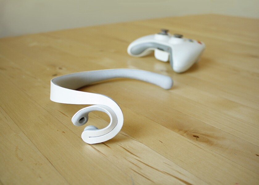 The headset is paired with a specially created game