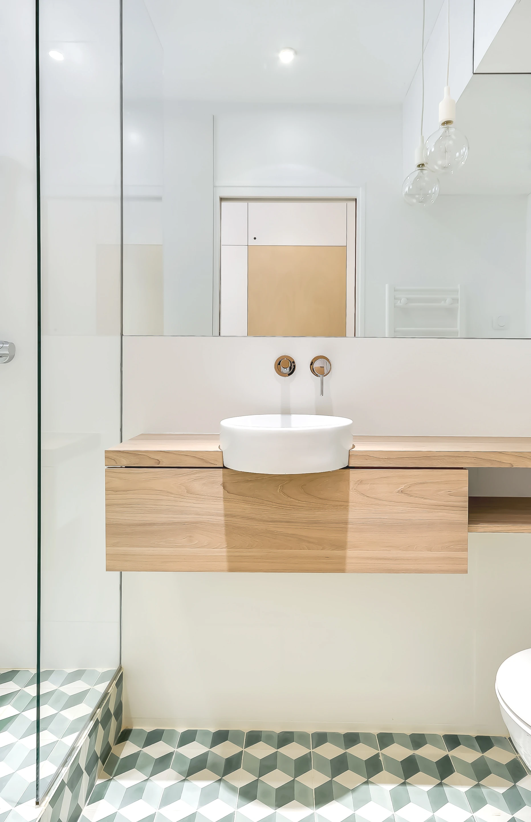 The bathroom measures just 2.3 sq m (24 sq ft) and includes toilet, sink, and shower but no bath (Photo: Meero)