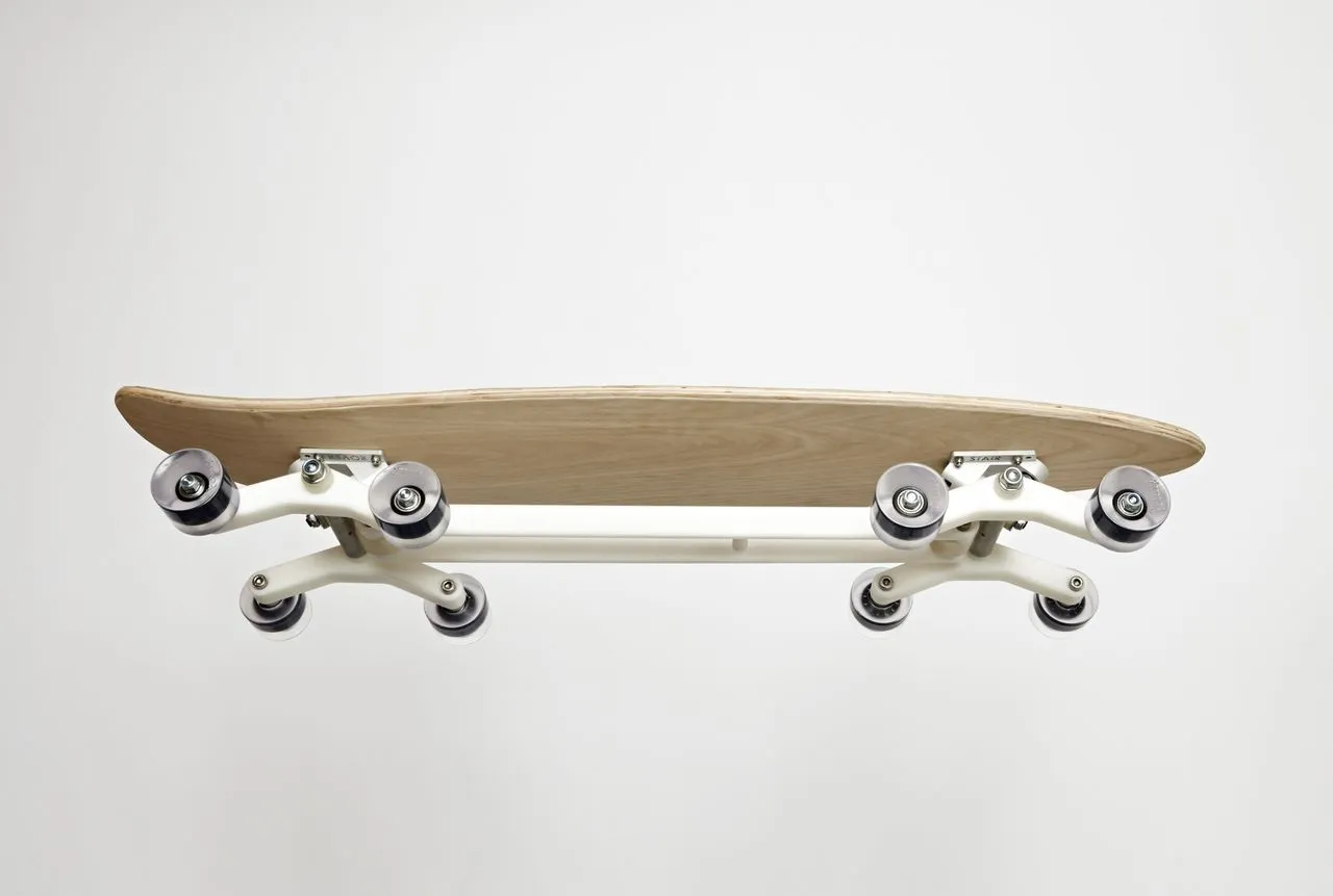 Unlike the previous version of the Stair-Rover (or at least, the last version we saw), the commercial model has all of its stair-surfing bits and pieces located on the underside of the deck