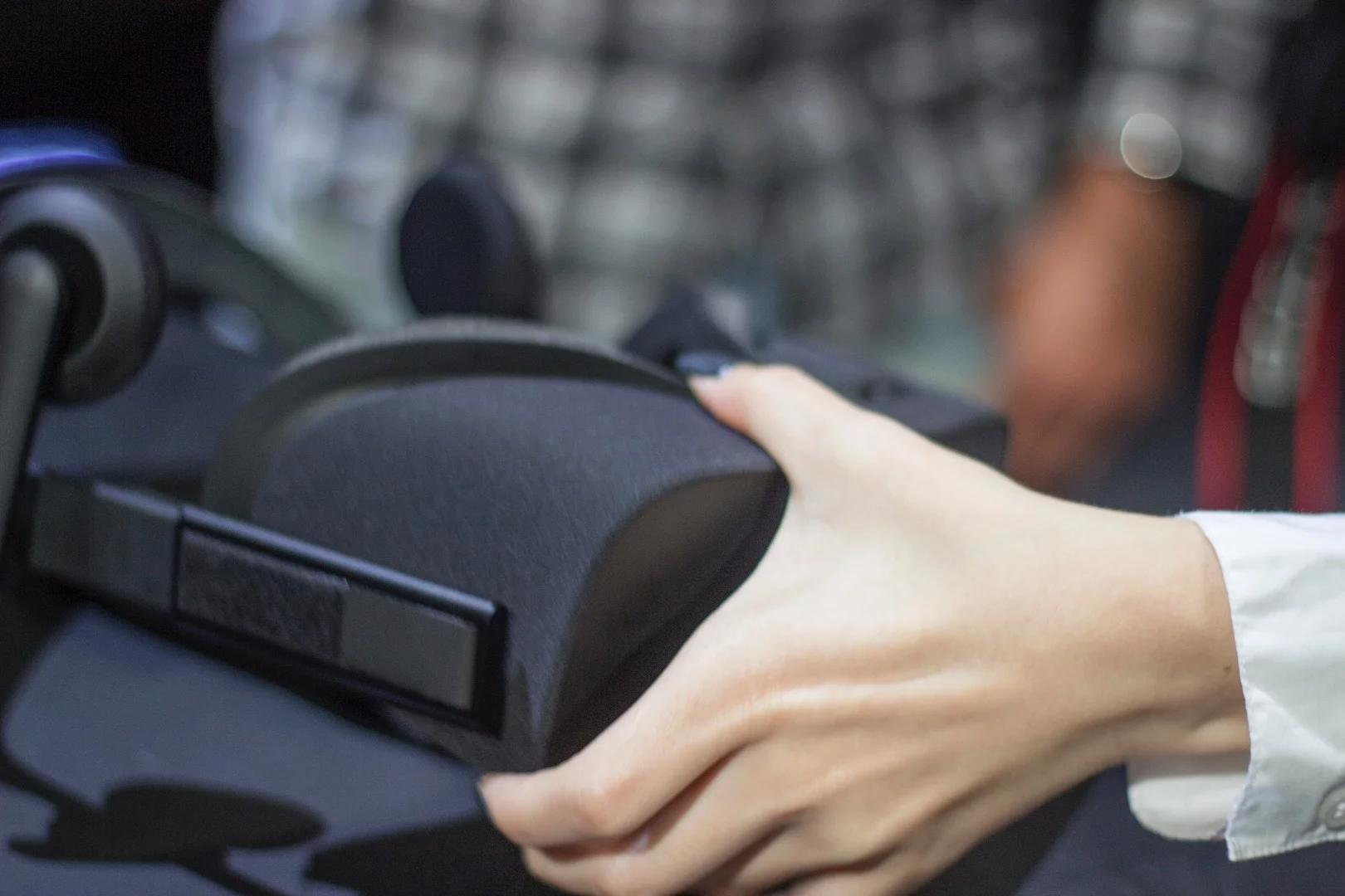 A naughty press member touching the no-touching allowed Oculus Rift at the event