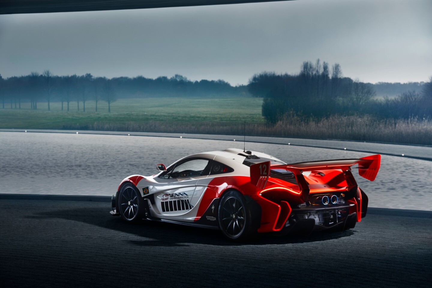 The rear wing has been modified with a gurney flap, larger end plates and some mini-wings beneath the main surface