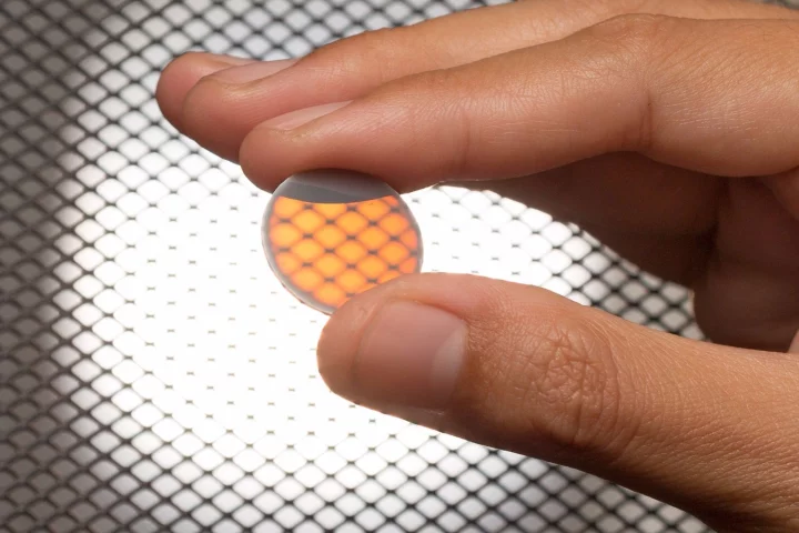 The implant is made of Yttria Stabilized Zirconia, a ceramic material