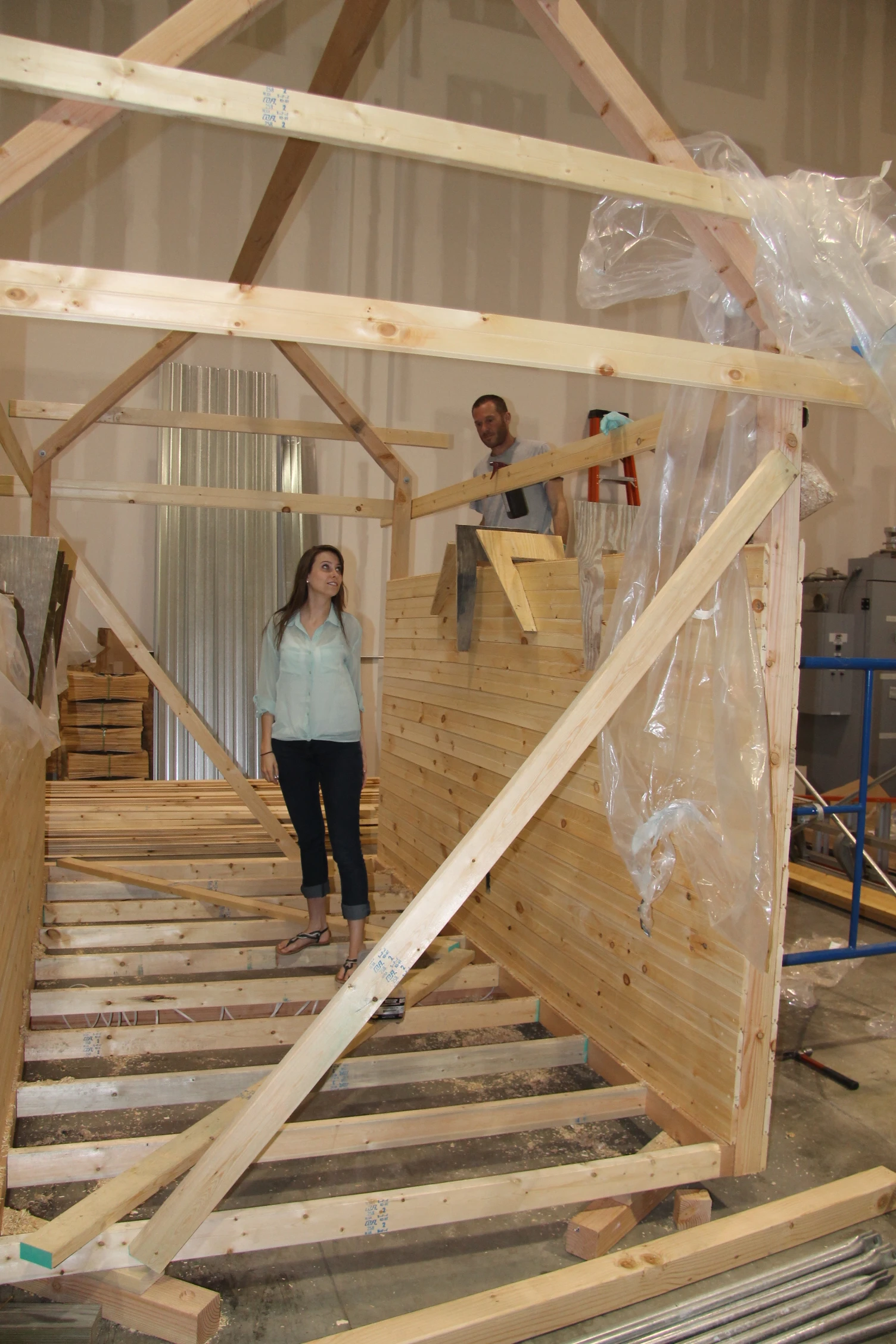 The Mushroom Tiny House is built using a wooden frame and wooden slats