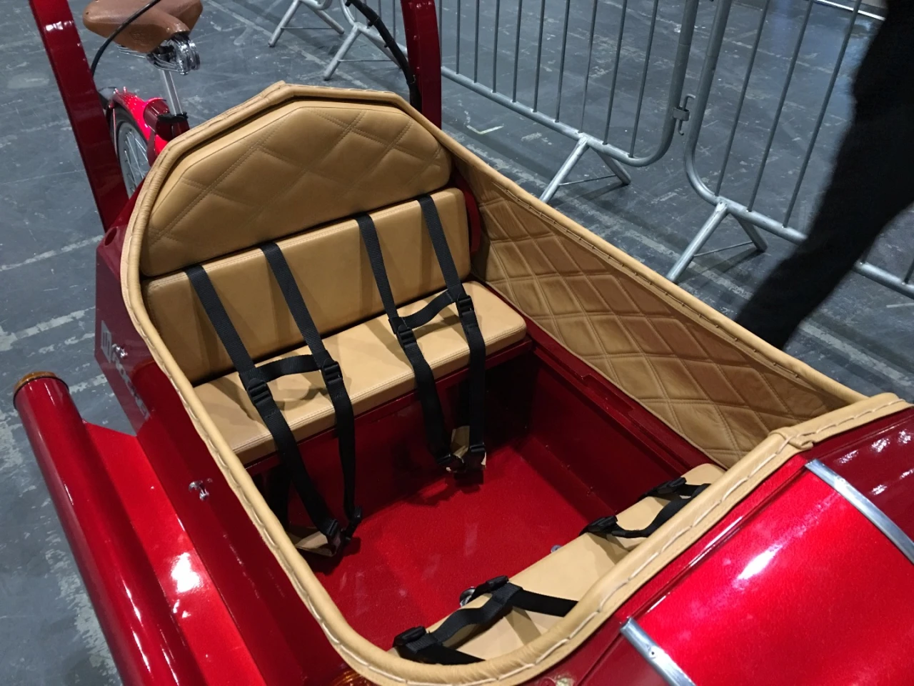 The two reclining benches seat four children and can fold flat to serve as a mattress