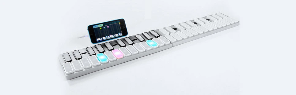 LED keys light up to indicate when different notes should be played, corresponding with floating icons onscreen