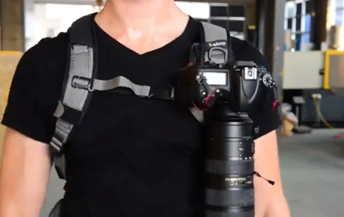 The Capture Camera Clip v2 allows you to clamp your DSLR camera onto the straps of a backpack