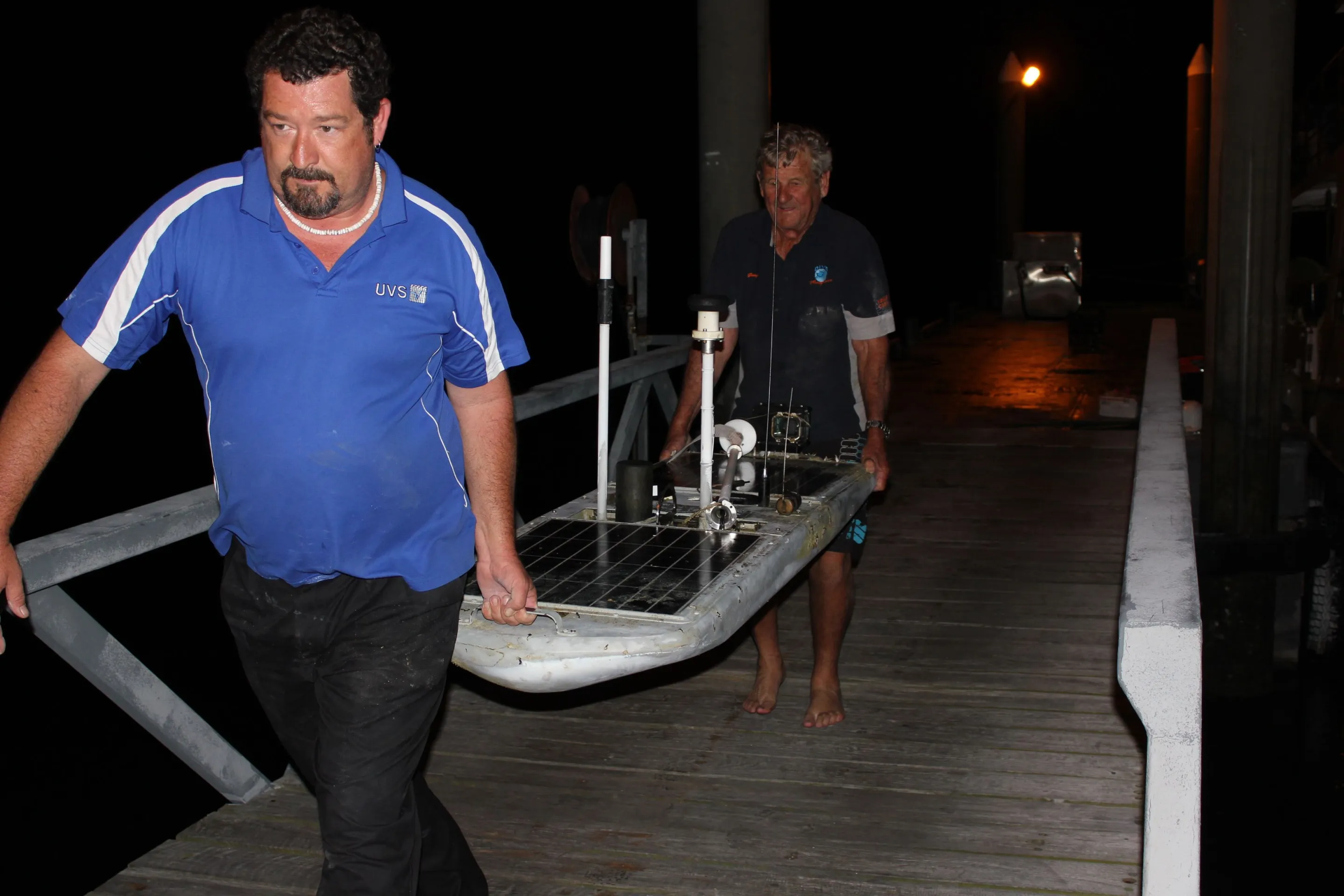 The Papa Mau being carried ashore