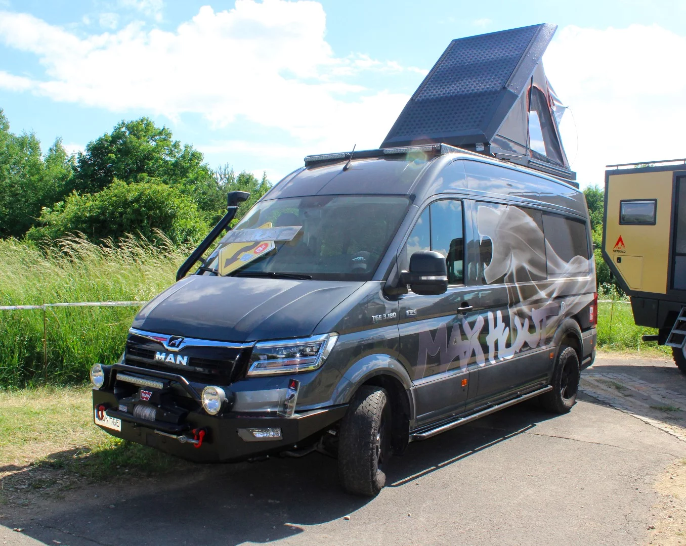 As much as we liked ICS Offroad's G-Class campers and larger expedition vehicles, our favorite was this MAN TGE camper van. Outside of a pair of concept camper vans from MAN itself, this is the first camper van we've seen based on the new TGE ... and it looks like years of fun