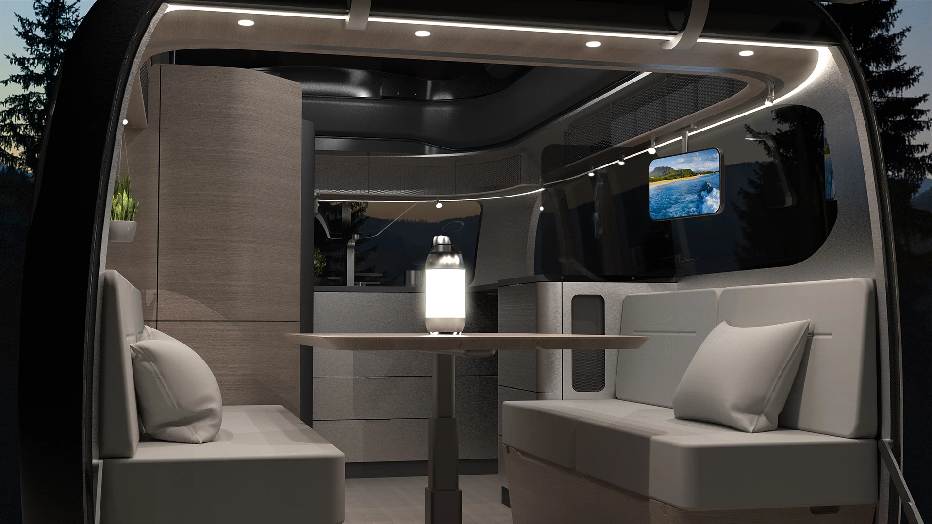 The interior shows a wraparound light design, small TV and dual-bench rear lounge