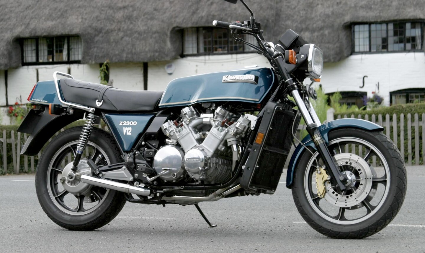 Allen Millyard was just 11 years-of-age when he began his non-traditional engineering journey by shoehorning a Morris MINI 850cc four cylinder car engine into a BSA Bantam frame. Things got weird(er) from there. This is his 2300cc V12 Kawasaki, built by combining the engines of two six-cylinder Z1300s