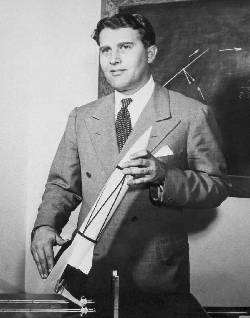 Werhner Von Braun and a model of his V-2 rocket