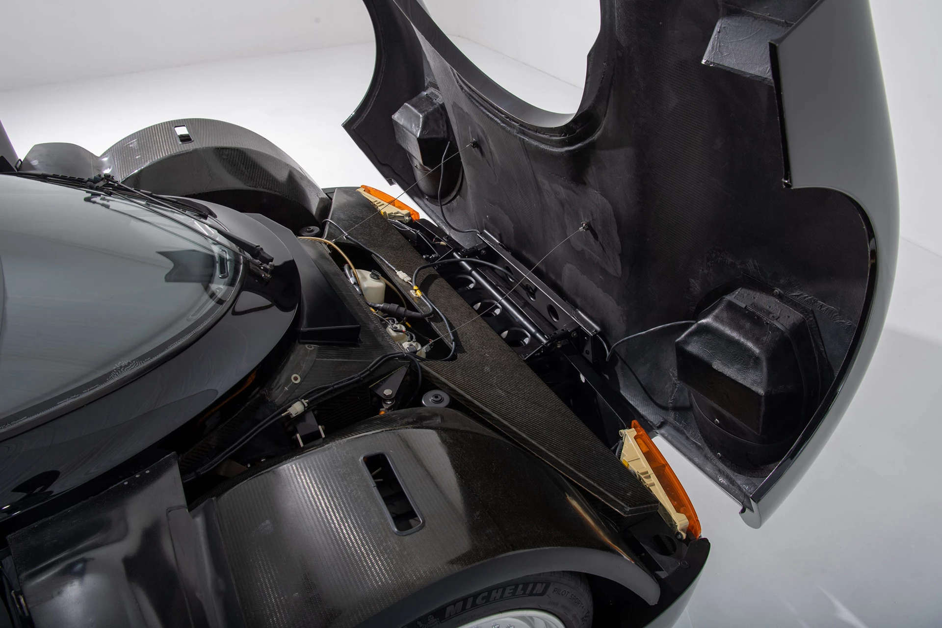 The Schuppan 962CR (Chassis # AS 962CR P2) that is currently for sale is the second prototype and was the first car to be built on the two-inch-wider Reynard carbon fiber chassis. The extra two inches were added to allow for slightly more cabin room and only four of these chassis were ever produced.