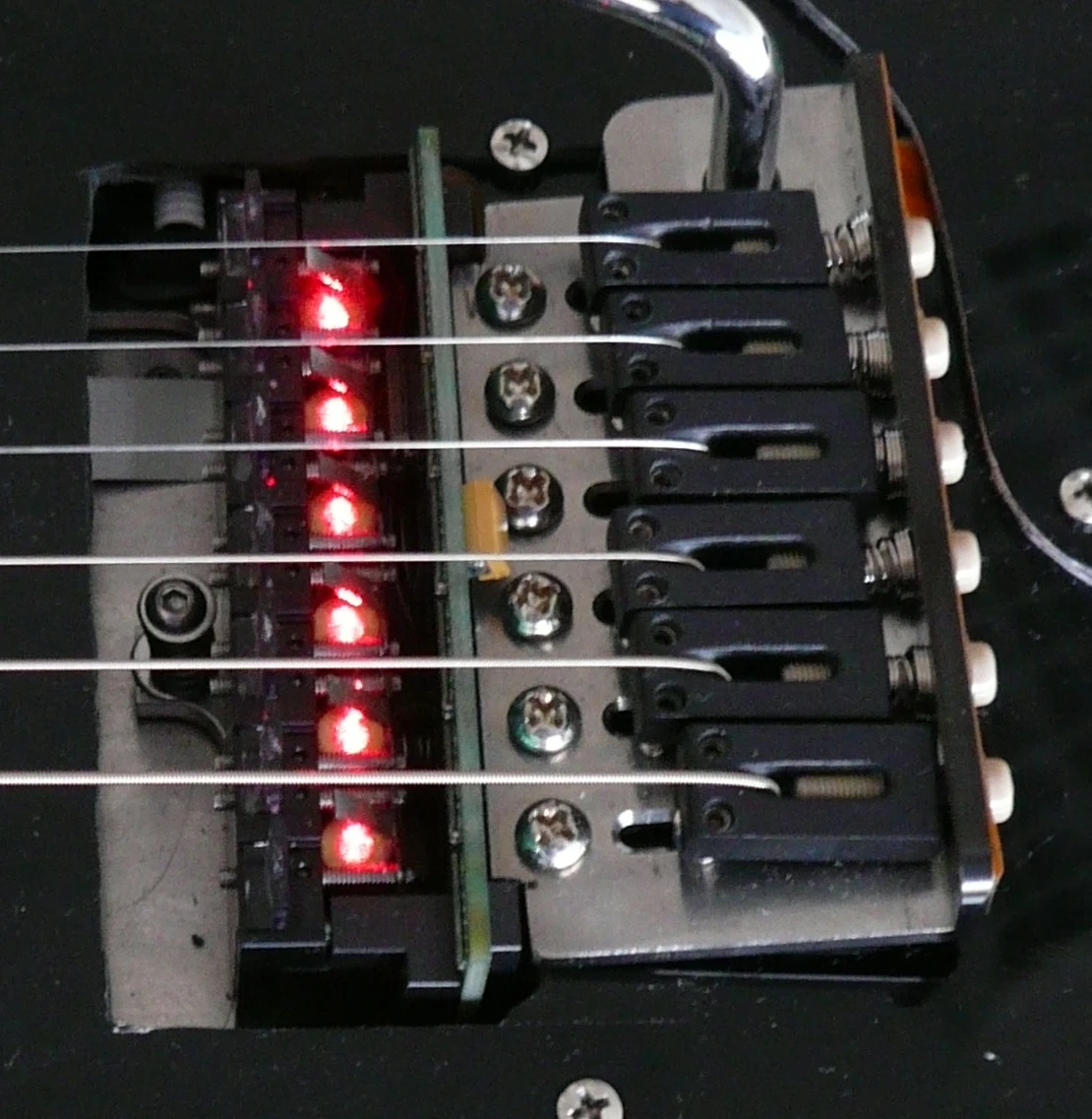 The LPD Pickup system also includes pressure-sensitive, piezo-elements built into the tailpiece to register such things as string bends