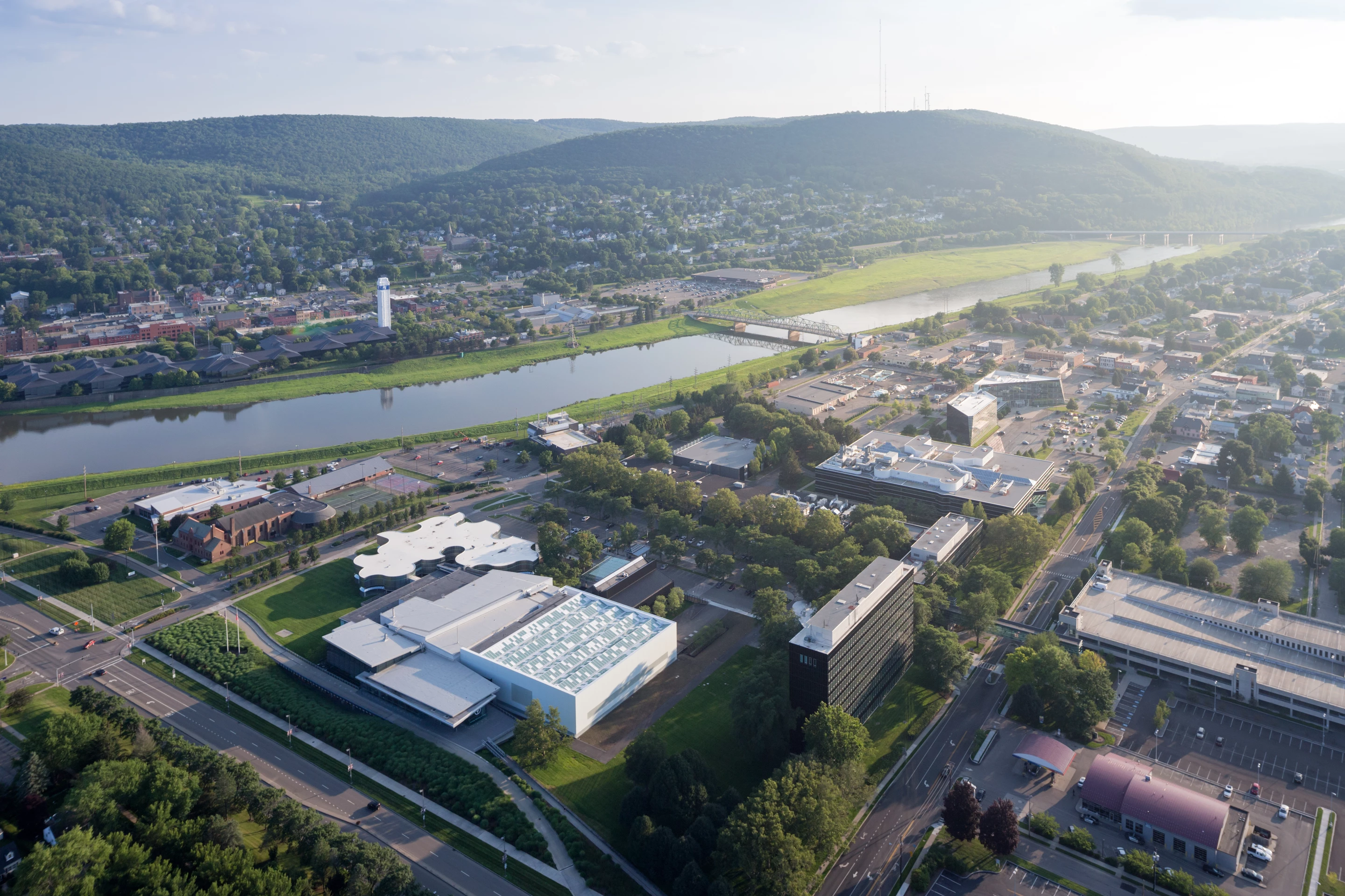 The new wing of the Corning Museum of Glass provides new offices for museum staff, a space room for community and school programming, a retail store, and a renovated hot glass workshop for live demonstrations