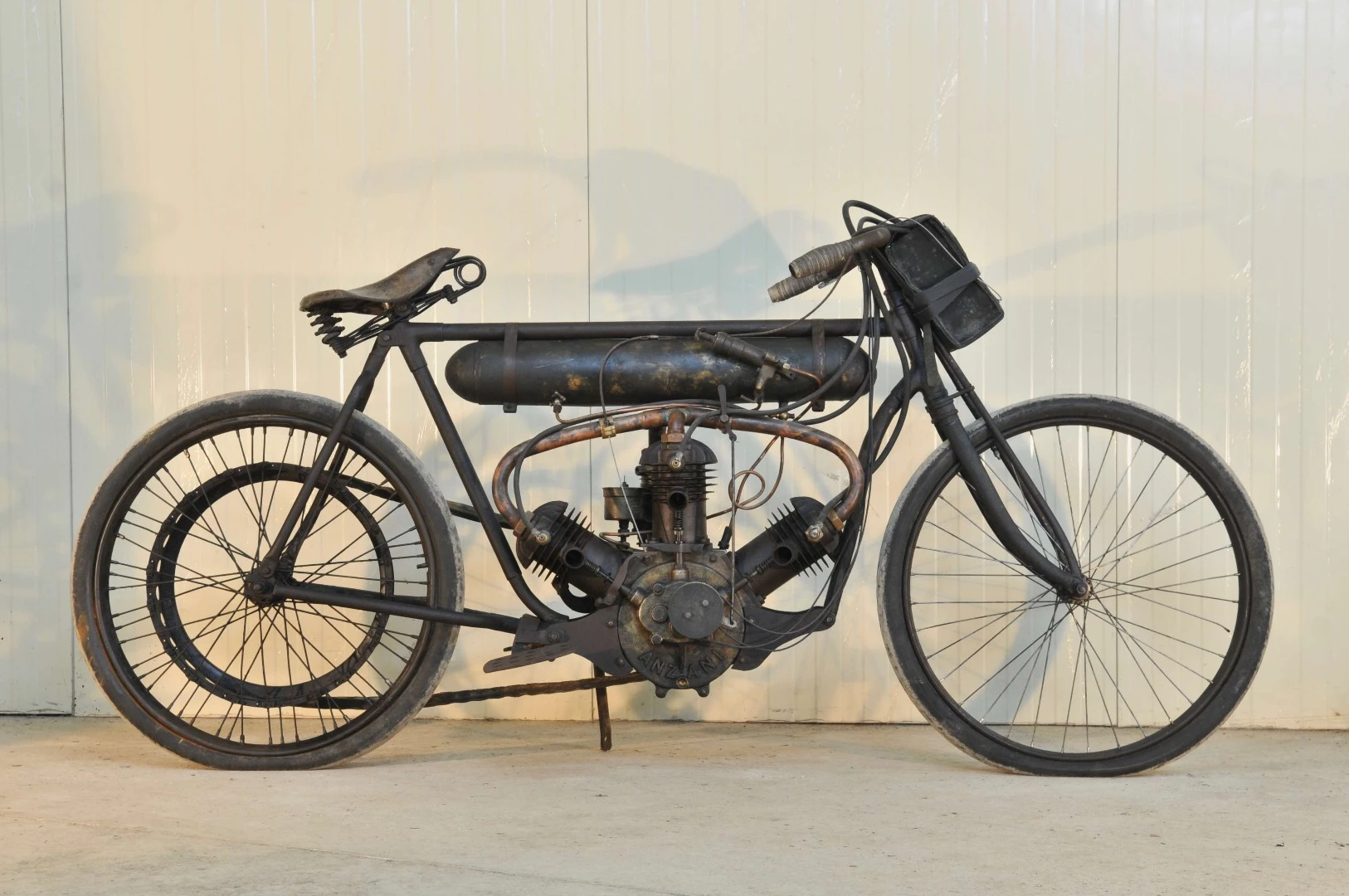 Alessandro Anzani is Italy's answer to Glen Curtiss, with both men riding motorcycles of their own manufacture in competition before going on to build massive companies around their engineering expertise. Anzani even made spare parts for Curtiss engines for many years. The engine in this motorcycle is not much different to the Anzani engine used by Louis Blériot to make the first flight across the English Channel in 1909. While Anzani was initially known for his 3-cylinder fan engines like the one above, he went on to make 2-, 3-, 4-, 5-, 6-, 7-, 10-, 14- and 20-cylinder engines in his factories in England, France and Italy, providing them to motorcycle manufacturers such as McEvoy, Montgomery, Cotton, and Greeves, while cars that used Anzani's engines included Morgan, AC, and Frazer-Nash. While the Anzani fetched nearly three times its estimate at $102,242(€ 83,440), another motorcycle on offer at Artcurial's official Retromobile auction with a three-cylinder fan layout caused a lot of interest, because the crankcase is clearly stamped as a Buchet, yet it is near identical to the Anzani and predates it by a year. The Buchet sold for €56,024 ($68,648), more than double its estimate.