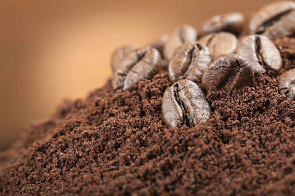 What are the consequences of putting coffee grounds