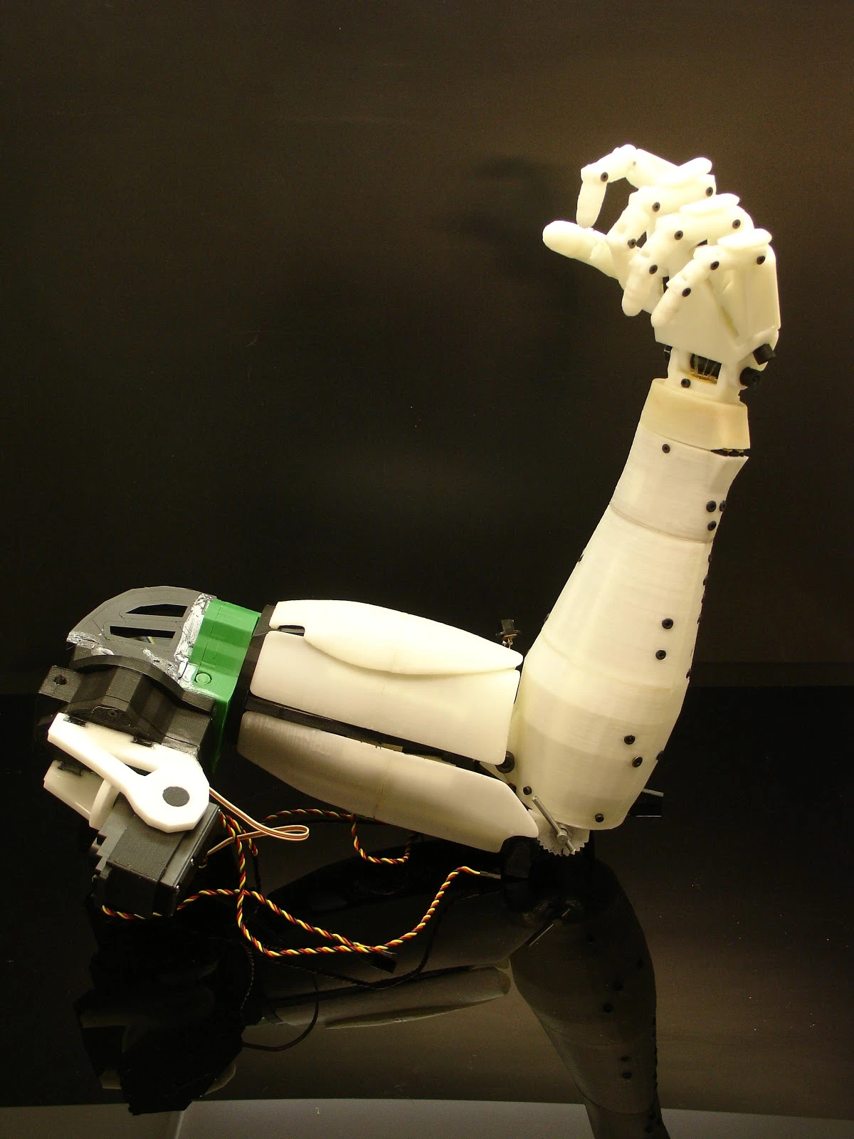 A completed InMoov arm, which can be built from parts shared on Thingiverse and electronics for approximately US$450 dollars each