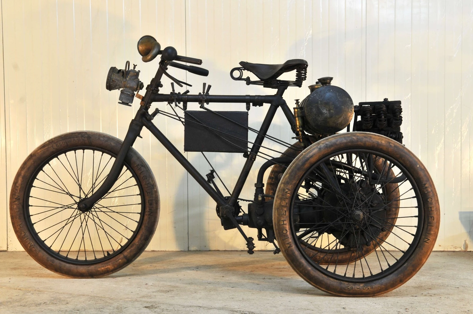 Yet another motorcycle developed by a pioneer of aviation. Indeed, Eugène Renaux was well known as a pioneer bicycle racer, pioneer motorcycle racer (winner of the 1899 Paris - St Malo race on a 500cc liquid-cooled tricycle exactly like this one, averaging 52 km/h for the 372 km race distance), pioneer car racer (winner of the 1906 Mercedes Cup, a 6,000 km stage car race across France), pioneer airplane racer, and a pioneer balloonist. This circa 1899 Renaux Tricycle sold for $167,969 ( € 137,080 )