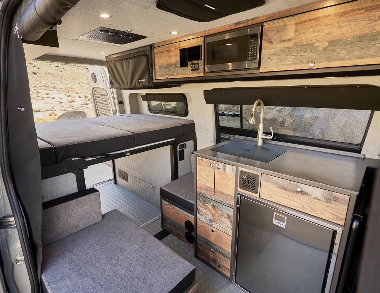 Outside switches the kitchen over to the driver's side to open up the passenger side entry