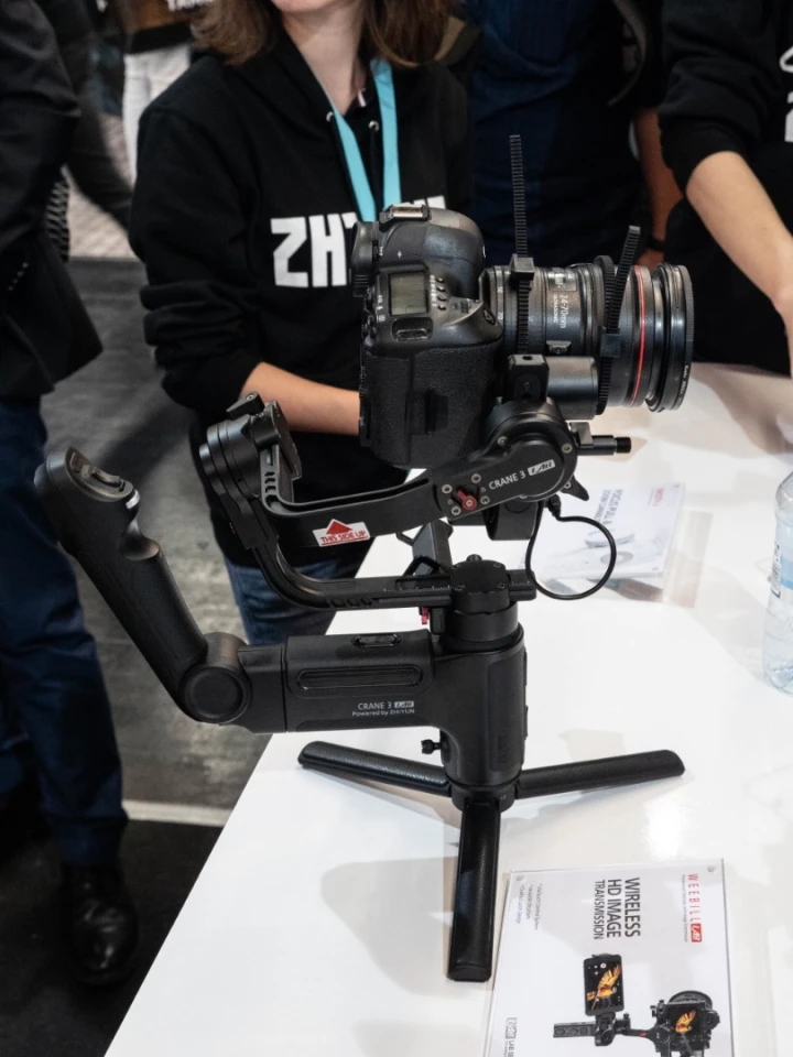Zhiyun brought its prototype Crane 3 stabilizing gimbal rig to Photokina, which proposes a totally new ergonomic for the DSLR gimbal, complete with a lot of built-in controls