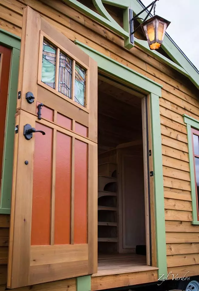 The Fuchsia's door area is lit by a small lantern