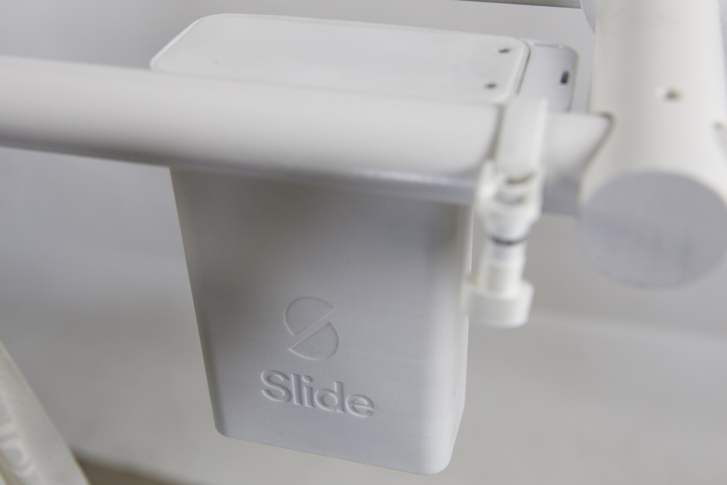 Setup is simple and you should be able to attach Slide to a curtain rail, track, or the curtain itself within a couple of minutes