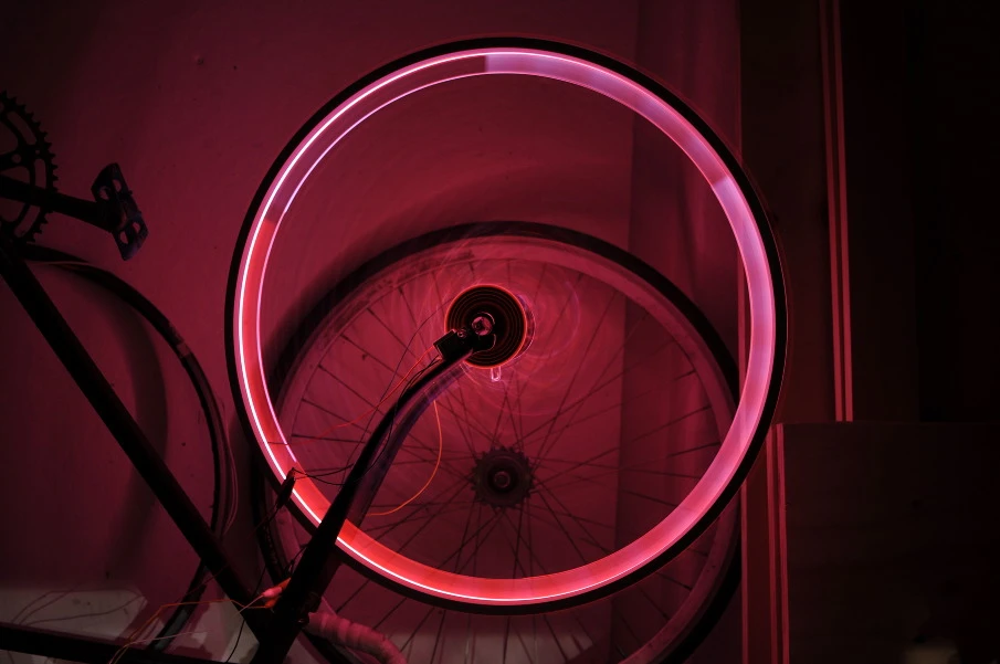 The Aura system uses embedded LEDs to turn a bike's rims into running lights