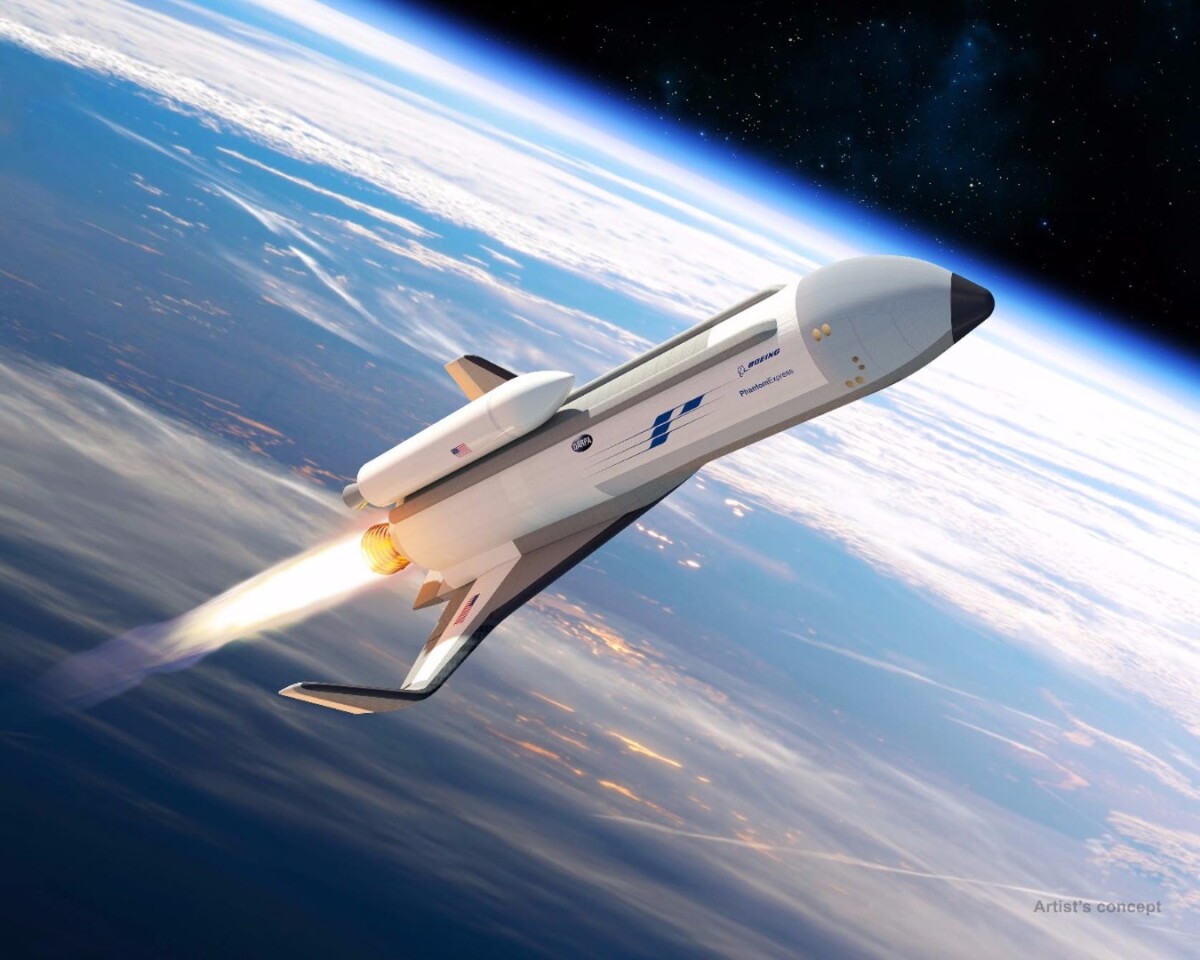 Phantom Express shown preparing to launch its expendable second stage on the top of the vehicle in this artist’s rendering