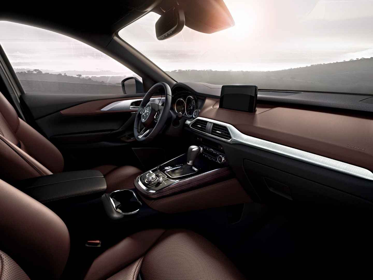 The CX-9's interior design draws on the rest of the range, but is aimed at upmarket drivers