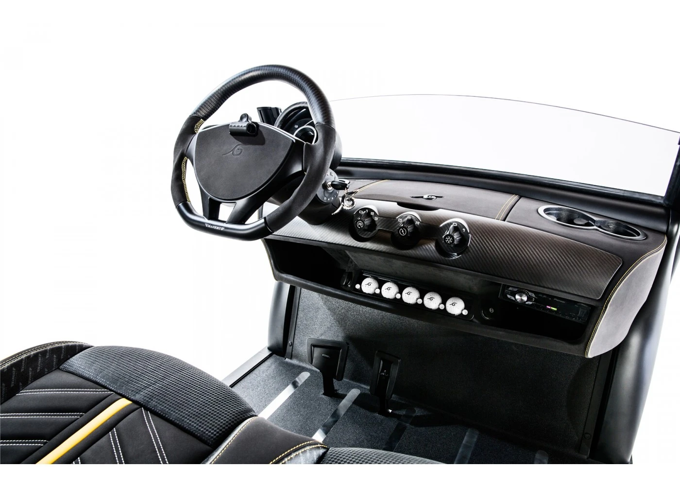 The golf car comes with signature Mansory spec including leather dashboard, custom seat, and carbon fiber rear body