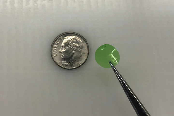 The sensor film is ordinarily green, but glows purple when exposed to near-infrared light in the presence of oxygen