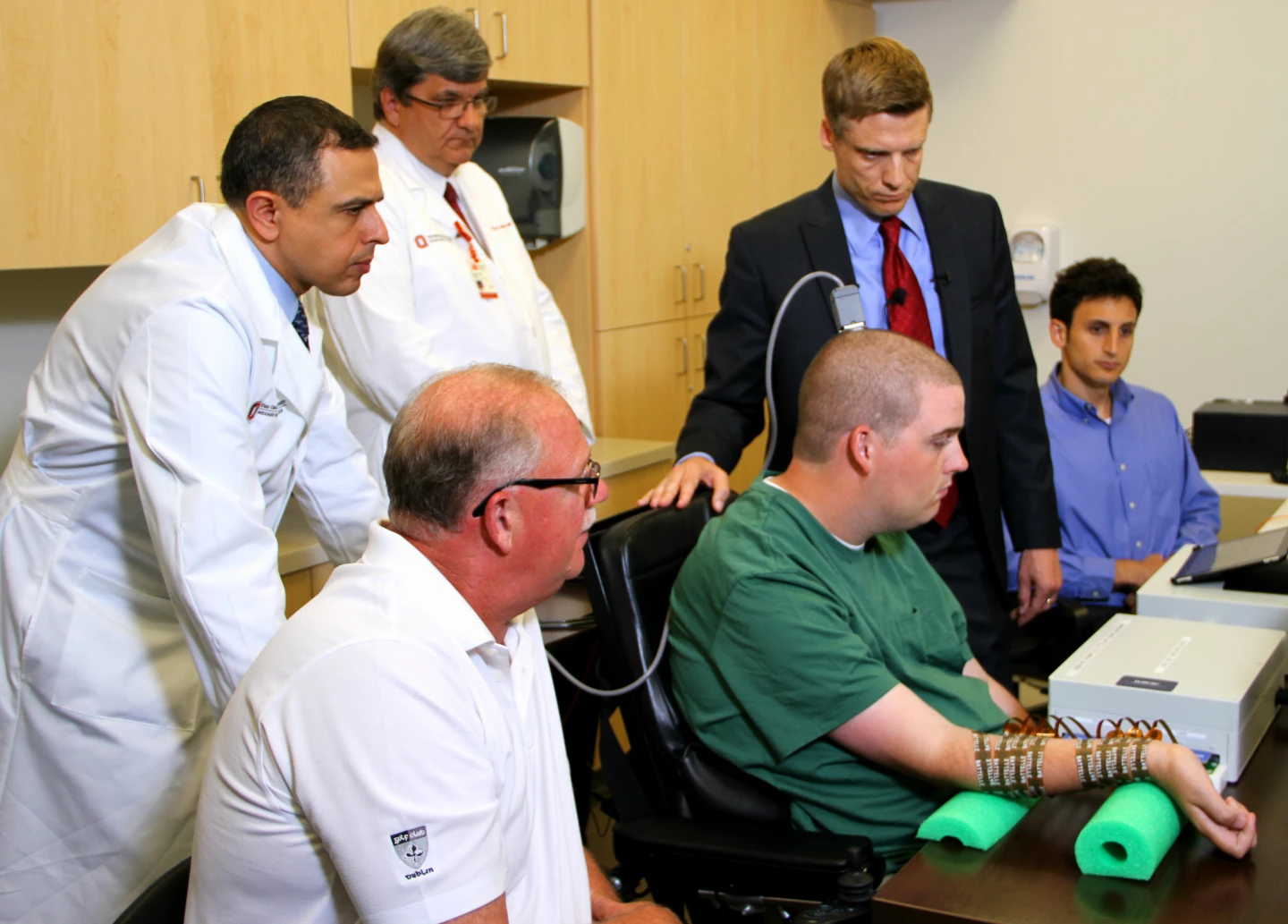 Brain implant and high-tech sleeve used to bypass spinal cord and move ...