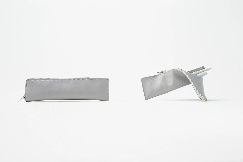 Once opened, the pencil case can be used as a desk-top pen holder