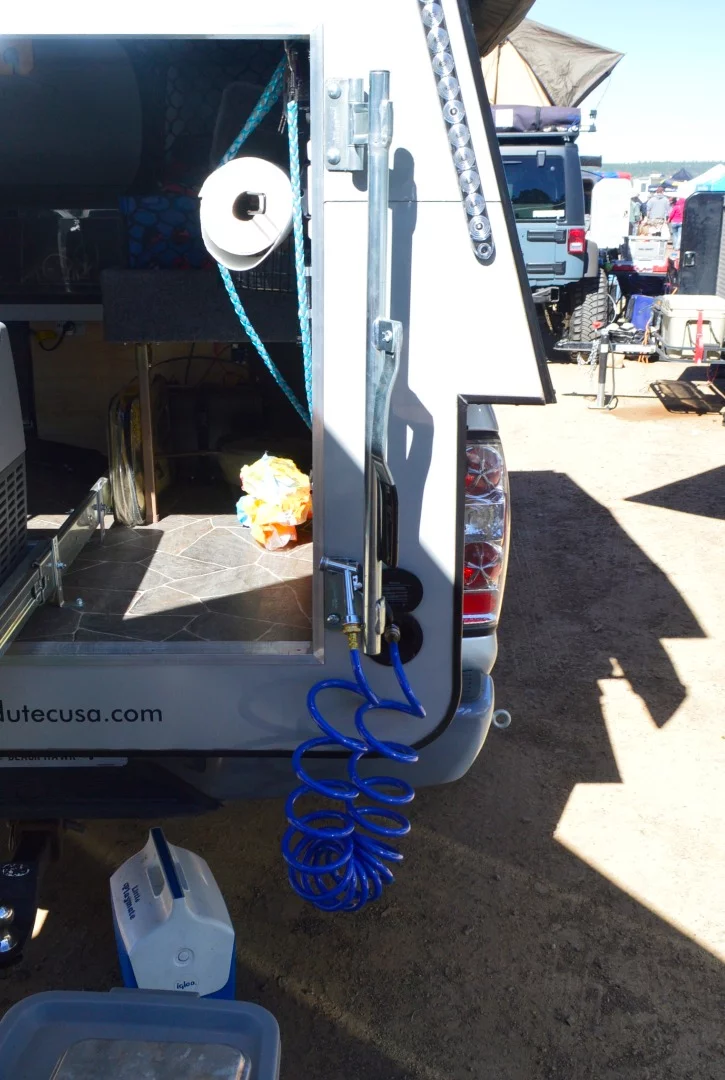 There's no faucet for the wash basin, but this Bivak has a more versatile hose