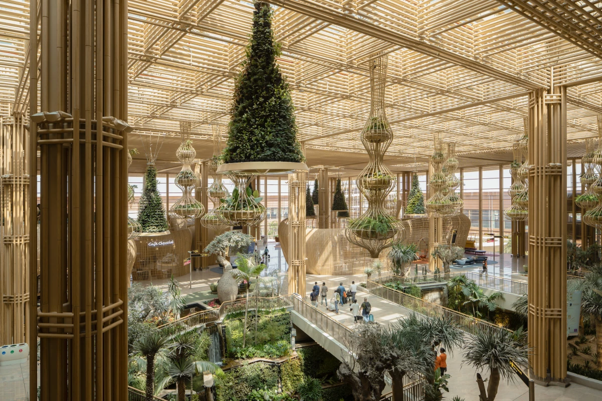 Terminal 2 at Kempegowda International Airport's interior is filled with greenery, including plants and trees