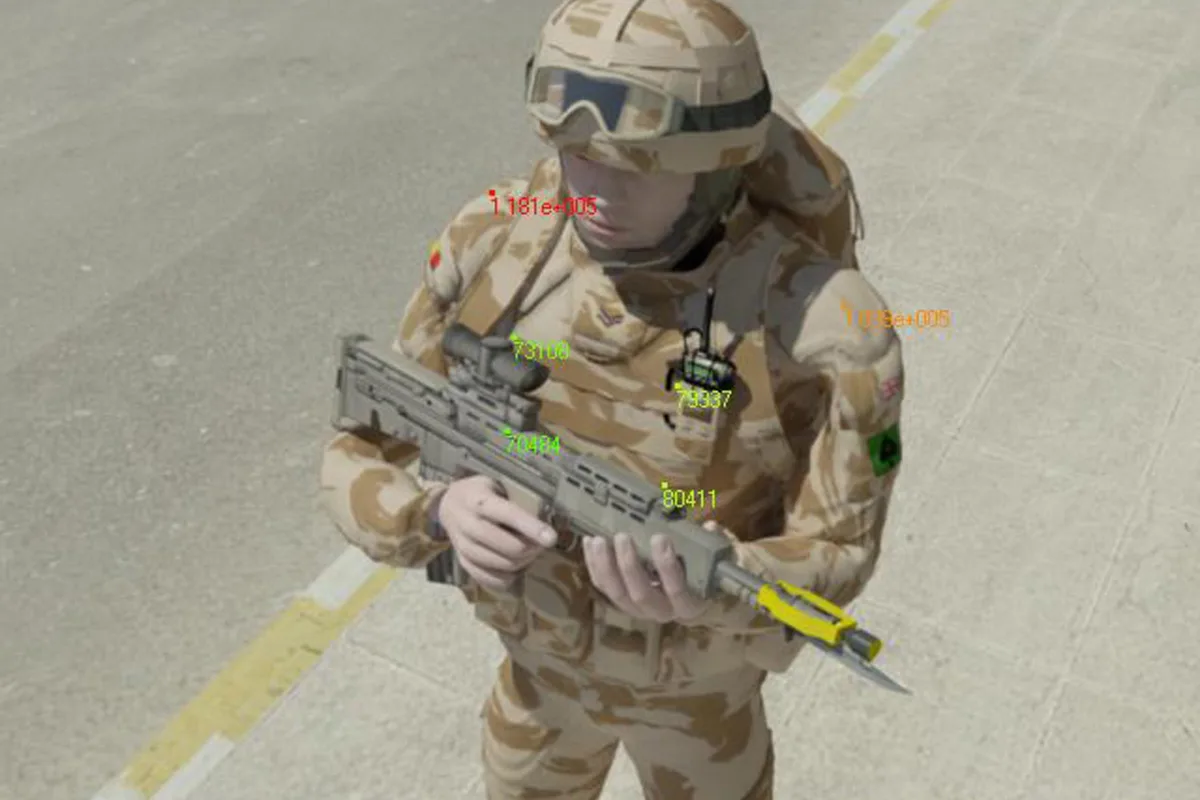 A soldier in a fictitious but realistic urban, desert environment, with superimposed numbers representing readings for anticipated sunlight (Image: EPSRC)