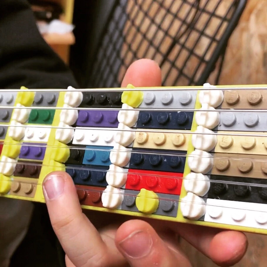The Lego Microtonal Guitar can be used to play semi-tones, or tones inbetween the semi-tones