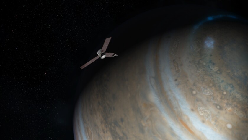 Artist's impression of of Juno passing the poles of Jupiter (Image: NASA/Caltech)