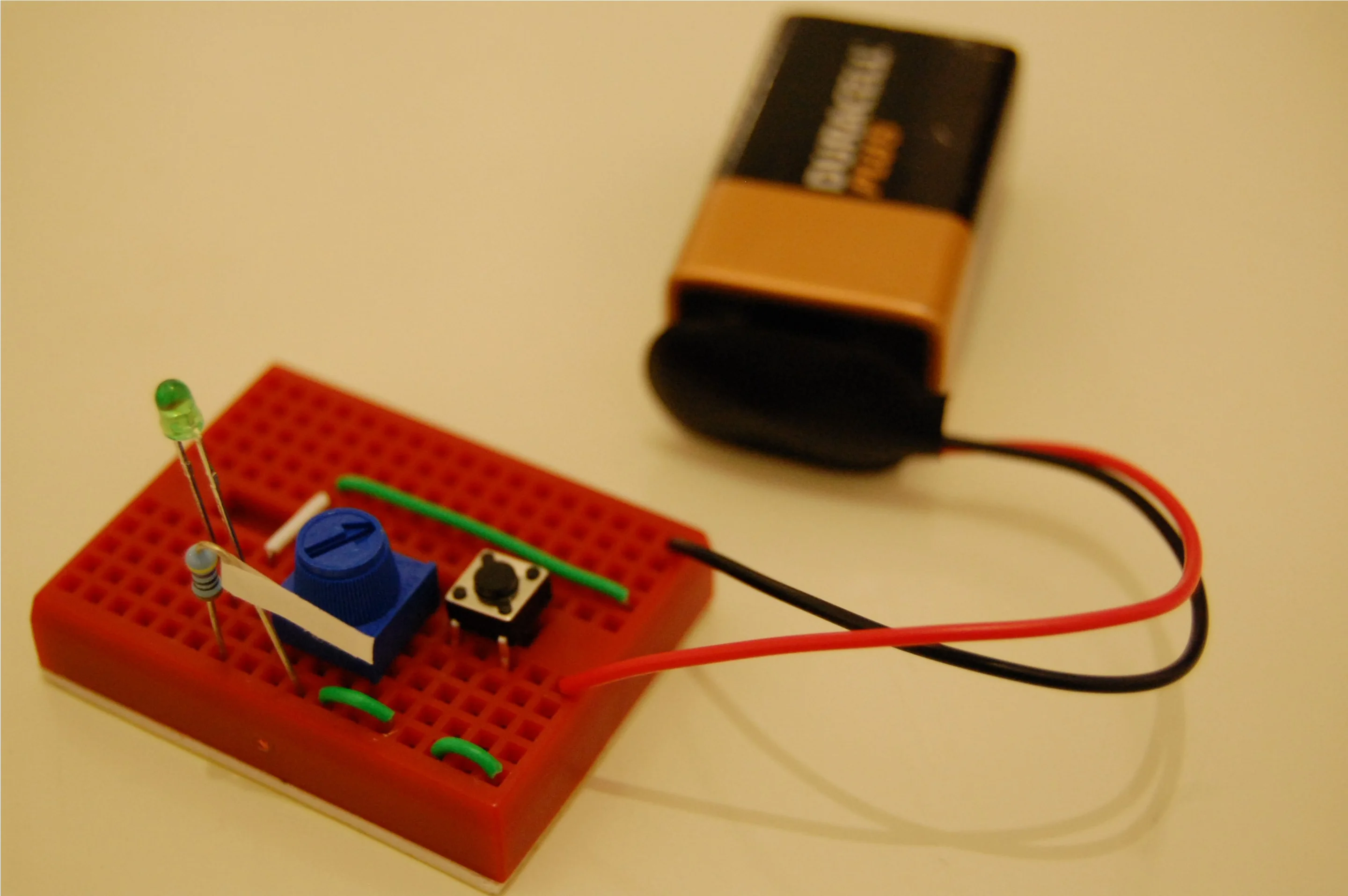 Turning the variable resistor dims the LED on Circuit 2 from the green intro booklet