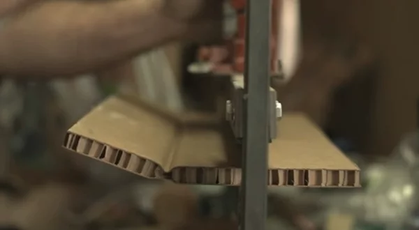 By folding and pressing the cardboard several times, the strength of the structure is increased markedly