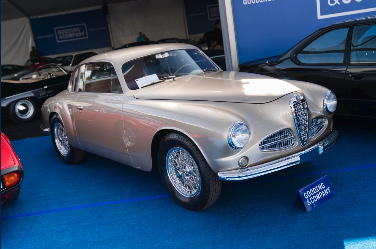 A beautiful car, just the third produced, with many pre-production features that evolved as production "settled," this car is particularly significant in that it was given to Juan Manuel Fangio for winning the 1951 World Formula One Championship for Alfa Romeo. Fangio drove the car for an indeterminate period before passing it to an acquaintance. The car's subsequent history is well documented and involves several restorations and many significant awards at America's most important concours events, most notably a Best of Class at the 2007 Pebble Beach Concours d’Elegance. The car was reunited with Fangio in the early 1990s where he signed the car's firewall. An image of that ocassion can be seen in the Gooding & Company auction gallery.